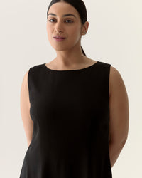 Scalloped sleeveless dress in Black