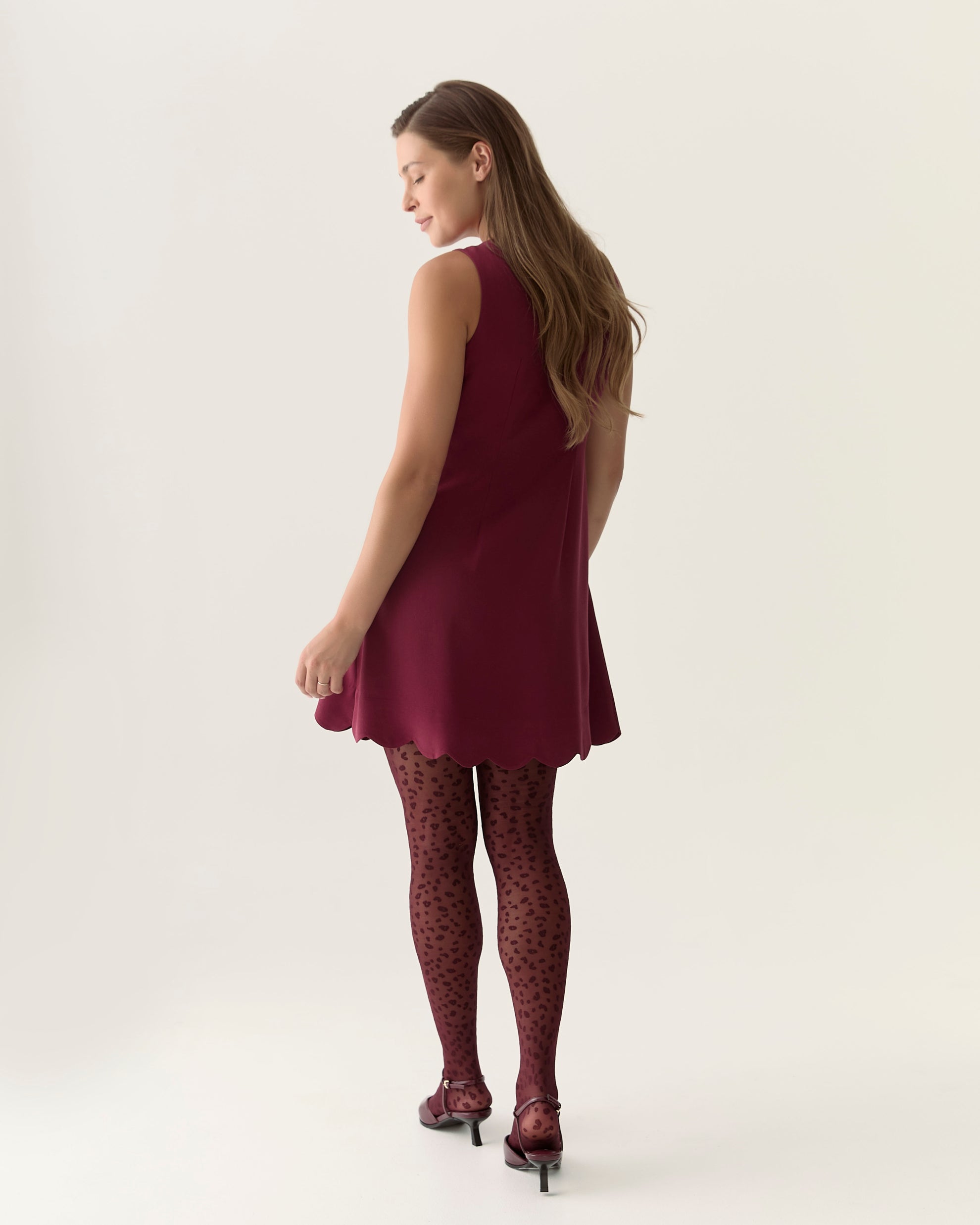 Scalloped sleeveless dress in Zinfandel