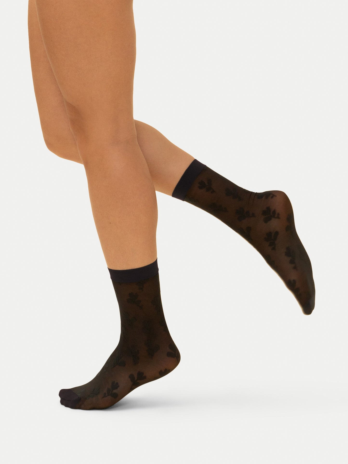 Chaussettes diaphanes florales en Noir